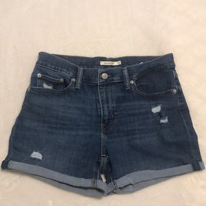 Levi’s mid length shorts.